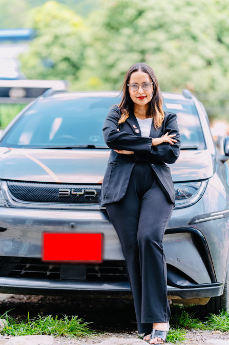 Advocate Suraksha Acharya in a stylish coat.